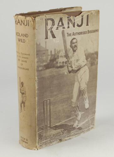 ‘Ranji. The Authorised Biography’. Roland Wild. London 1934. Slight wear to original rarely seen dustwrapper, some wear with small loss to top edge of the dustwrapper on the front and the back, some spotting to page block. G