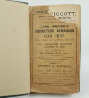 Wisden Cricketers’ Almanack 1897 and 1898. 34th & 35th editions. Bound in dark green boards, with original paper wrappers, with gilt titles to spine, the 1897 edition with front wrapper only. The 1897 edition with loss to the top right hand side of the fr