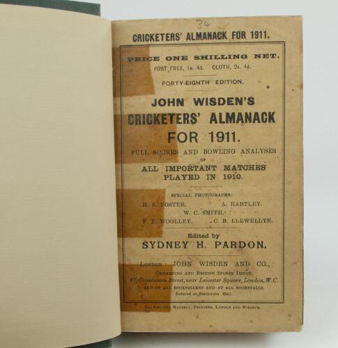 Wisden Cricketers’ Almanack 1911 and 1912. 48th & 49th editions. Bound in dark green boards, with original paper wrappers, with gilt titles to spine. The wrappers of the 1911 edition with tape to edges of the wrapper, odd page tightly trimmed by the binde