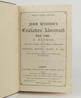 Wisden Cricketers’ Almanack 1886. 23rd edition. Bound in maroon boards, lacking original paper wrappers, advertising page at front and advertising pages at rear, with gilt titles to spine, red speckled page edge. Minor soiling to page block edge otherwise