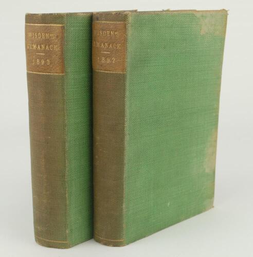 Wisden Cricketers&rsquo; Almanack 1892 and 1893. 29th & 30th editions. Both bound in green boards, lacking original paper wrappers, advertising pages at front and at rear, with gilt titles to spine. Some wear to green boards on both editions, the 1893 edition w