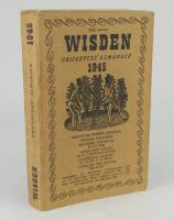 Wisden Cricketers’ Almanack 1945. 82nd edition. Original limp cloth covers. Only 5600 paper copies printed in this war year. Odd minor faults otherwise in good+ condition. Rare war-time edition