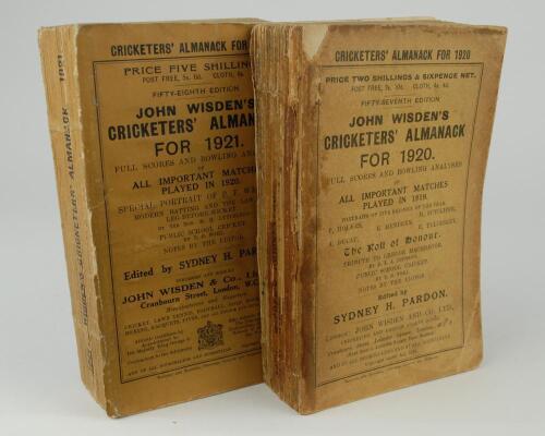 Wisden Cricketers&rsquo; Almanack 1920 and 1921. 57th & 58th editions. Original paper wrappers. Both editions with some breaking to spine block. The 1920 edition with almost total loss to spine paper, darkening to edge of wrappers nearest to spine, some wear an