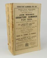 Wisden Cricketers’ Almanack 1924. 61st edition. Original paper wrappers. Some wear and staining to spine paper with small loss, breaking to spine block at the front of the book otherwise in generally good/very good condition