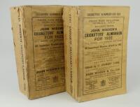 Wisden Cricketers’ Almanack 1932 and 1933. 69th & 70th editions. Original paper wrappers. Both editions with breaking to spine block, page blocks becoming loose. The 1932 edition with wear and light soiling with small loss to wrapper extremities, some wea