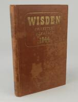 Wisden Cricketers’ Almanack 1944. 81st edition. Original hardback. Only 1500 hardback copies were printed in this war year. The boards and spine paper are worn and the spine has dulled gilt titles, the gilt titles clearer and more legible on the front boa