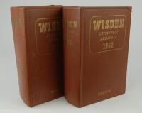 Wisden Cricketers’ Almanack 1962 and 1963. Original hardback editions. The 1962 edition with bump to top right hand corner of the front board, light crease to spine paper, the 1963 edition with very minor wear to front board, wrinkling to spine paper othe