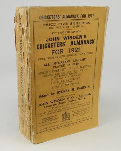 Wisden Cricketers&rsquo; Almanack 1921. 58th edition. Original paper wrappers. Breaking to spine block, internal page sections becoming loose, loss to spine paper, minor wear to front and rear wrapper otherwise in good condition