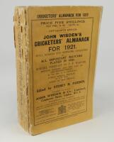 Wisden Cricketers’ Almanack 1921. 58th edition. Original paper wrappers. Breaking to spine block, internal page sections becoming loose, loss to spine paper, minor wear to front and rear wrapper otherwise in good condition