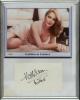 Kathleen Turner. American film actress. Signature of Turner on white card, mounted below colour image of Turner, framed. Crack to glass. Overall 8.25&rdquo;x10.5&rdquo;. G.