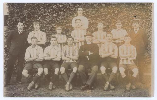 Exeter City F.C. 1909/10. Early original mono real photograph postcard of the Exeter City team seated and standing in rows wearing football attire. &lsquo;X&rsquo; annotated in ink to one player mentioned in correspondence to verso. Postmarked 1910. Photographer unkn