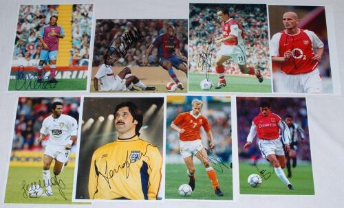 Arsenal F.C. Eight colour press photographs of Arsenal players, each signed by the featured player. Signatures are David Seaman, Thierry Henry, Dennis Bergkamp, Jermaine Pennant, Paul Merson, Marc Overmars etc. Approx. 10&rdquo;x8&rdquo;. VG.