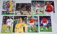 Arsenal F.C. Eight colour press photographs of Arsenal players, each signed by the featured player. Signatures are David Seaman, Thierry Henry, Dennis Bergkamp, Jermaine Pennant, Paul Merson, Marc Overmars etc. Approx. 10”x8”. VG.