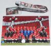 Manchester United F.C. Five colour press photographs of Manchester United players, each signed by the featured player(s) or manager. Signatures include Tommy Docherty, Peter Schmeichel, Jaap Stam, Wayne Rooney, Christiano Ronaldo, Carlos Tevez etc. Sold w - 2