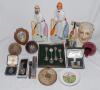 Cricket ceramics and metalware. A selection including &lsquo;Cricketers&rsquo; Tape&rsquo;, original measuring tape with brass fittings, two silver cricket medals, one hallmarked, three silver cricket spoons, Sandland ceramic red cricket ball shaped ashtray with printed si