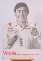 Fred Trueman. ‘Vitalis- Keeps even my hair neat all day’. Original 1960’s free standing card advertising sign/show card showing Trueman, half length, in England sweater holding and pointing at the bottle of Vitalis. Approx 19”x28”. Some wear, scratching, 