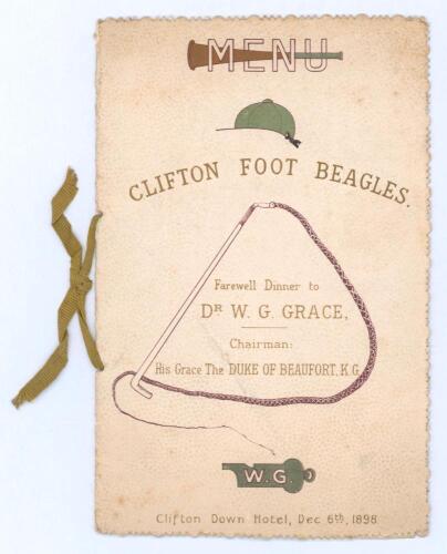 Farewell Dinner to Dr W.G. Grace 1898’. Original menu card for the Dinner, given by the Clifton Foot Beagles, held at the Clifton Down Hotel on December 6th 1898. Decorative and colourful front cover, with green ribbon tie, with images of hunting horn, wh