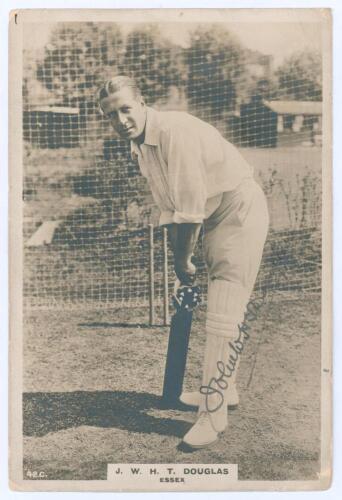 John William Henry Tyler ‘Johnny’ Douglas. Essex & England 1901-1928. Phillips ‘Pinnace’ premium issue cabinet size sepia real photograph trade card of Douglas, full length in batting pose in the nets. Nicely signed in ink to the photograph by Douglas. No