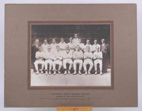 ‘Victorian Team. Season 1923-24’. Large and impressive official sepia photograph of the Victoria team, seated and standing in rows, wearing cricket attire. The photograph, by Talma of Melbourne