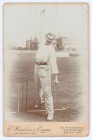 Charles Jesse Kortright. M.C.C. & Essex 1893-1907. Original mono cabinet card photograph of Kortright, full length in bowling pose at the wicket. E. Hawkins & Co. of Brighton. Card measures 4.25”x6.5”. Vertical crease, minor bumping to corners, otherwise 