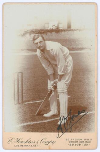 Arthur Owen Jones. Nottinghamshire, Cambridge University & England 1892-1914. Original sepia cabinet card photograph vignette of Jones standing full length in batting pose at the wicket. Nicely signed in black ink to the photograph by Jones. E. Hawkins & 