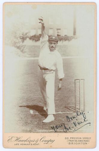 Joseph ‘Joe’ Vine. Sussex, London County & England 1896-1922. Original sepia cabinet card photograph vignette of Vine standing full length in bowling pose at the wicket, wearing Sussex cap. Nicely signed in black ink to the photograph by Vine. E. Hawkins 