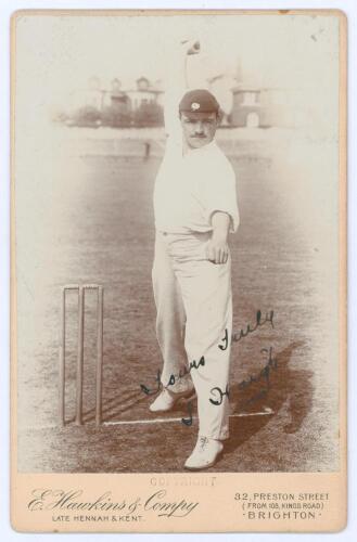 Schofield Haigh. Yorkshire & England 1895-1913. Original sepia cabinet card photograph vignette of Haigh standing full length in bowling pose at the wicket, wearing Yorkshire cap. Nicely signed in black ink to the photograph by Haigh. E. Hawkins & Co. of 