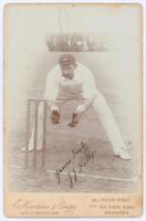 James Joseph Kelly. New South Wales & Australia 1894-1905. Excellent sepia cabinet card vignette photograph of Kelly depicted full length in wicket-keeping pose, wearing his Australian Test cap. Nicely signed in black ink to the photograph ‘Yours Truly JJ