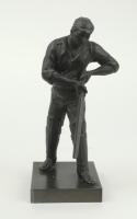 Charles Burgess Fry. Early 20th century spelter figure of C.B. Fry wearing cricket cap portrayed in batting pose playing a shot. This was one item of a three piece garniture, all featuring Fry as a batsman and bowler, with the centrepiece of him as a wick