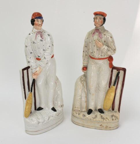 Julius Caesar and George Parr. A pair of original large Staffordshire cricketing figures, believed to be of Caesar and Parr. Both figures beautifully decorated, the figure of Caesar standing beside a set of brown cricket stumps holding a cricket bat, wear