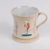 Staffordshire waisted cricket mug with strap handle and beaded rim, with cream background and three raised figures of a batsman, bowler and wicket keeper, believed to be Lillywhite, Pilch and Box decorated in orange, mauve and green. c1870. Silver lustre 