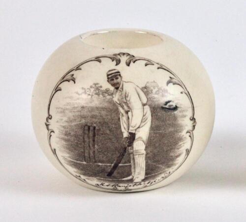 Kumar Shri Ranjitsinhji. Sussex & England 1895-1920. A stoneware circular match holder with transfer printed full length image of Ranjitsinhji full length in batting pose. Produced by Kepple of Bristol. Approx 2.75” high. Registration number R319664 for 1