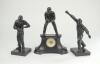 Charles Burgess Fry, Sussex & England 1892-1921. Victorian spelter three piece clock garniture featuring C.B. Fry. The clock cast with a wicket keeper a top it, flanked by Fry as a bowler and Fry as a batsman, celebrating Fry as the great English all-roun