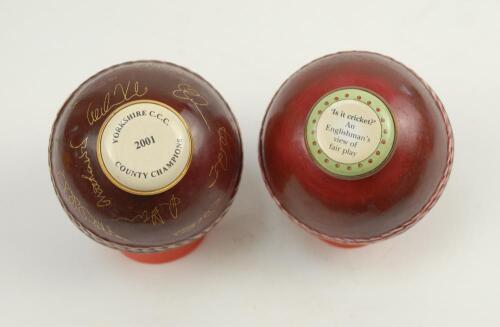 ‘Yorkshire County Cricket Club ‘County Champions 2001’. Pair of unusual Halcyon Days enamel bonbonnières both in the form of a cricket ball, one with the screw cover inscribed ‘Yorkshire C.C.C. County Champions 2001’, the ball with Yorkshire white rose em