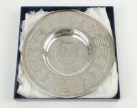 ‘Ashes Regained. England 1985’. Silver plate dish with title to centre, Test match results and players names and biographies to borders. 6” diameter. In original presentation box. VG