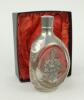 E.W. ‘Jim’ Swanton. Glass and pewter ‘Haig Dimple’ whisky decanter with ‘Dimple’ motif pewter panel to one side, with floral decorations, ‘Haig’, and coats of arms to sides. Maker’s mark for Daalderop Royal Holland Pewter, no. N4919 to base. 8.5” tall. Ac