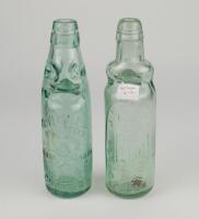 Cricket bottles. Attractive cricket glass lemonade bottles c1870/90’s with ‘Codd’s patent’ glass ‘marble’ ball stop and ‘Rylands Bulb patent’ glass ‘marble’ ball stop. One for ‘B. Noble of Birstall’ with figure of a batsman, stumps and ball to side of bot