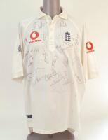 England Test cricket shirt with England emblem and Vodafone logo to chest signed by twenty seven England players. Signatures include Flintoff, Gough, A. Hollioake, Stewart, Butcher, Giles, Habib, Hussain, Knight, Read, Shah, Silverwood, Ward, White etc. A