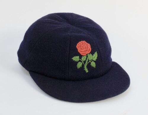 David Paul Hughes. Lancashire 1967-1991. Lancashire C.C.C. navy blue cloth cricket cap, by Foster of London, with beautifully embroidered Lancashire emblem of the red rose to front. D. Hughes’ to inner label. Minor wear internally otherwise in good/very g