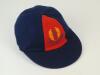 Jason Foster. East Torrens District Cricket Club cricket cap, by ‘S.A. Cap Co, Oakbank, South Australia’ worn by Foster whilst playing for the club. The navy blue cap, by with distinctive red panel with emblem and club name to front. Very good condition