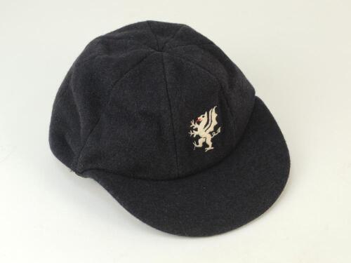 Somerset navy blue county 1st XI cricket cap with county emblem to front. The cap by Dege of Savile Row. Ownership unknown. Good condition. Previously sold by Vennett-Smith auctioneers in 2002