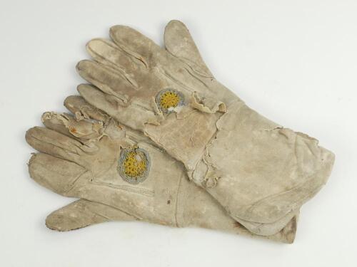 Wicket keeping gauntlets 1890’s. An early example of a of a pair of white kid leather wicket-keeping gloves used in the period, made by Geo. G. Bussey & Co of Peckham. These are similar to the previous gloves in their range except that these gloves have b