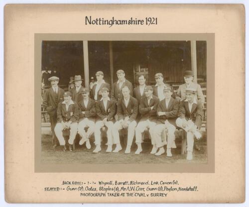 Nottinghamshire v Surrey 1921. Mono photograph of the Nottinghamshire team, standing and seated in rows, who played Surrey at the Oval in 1921. Players include Arthur Carr (Cpt), John Gunn, George Gunn, Whysall, Lee, Staples, Payton, Hardstaff etc. The ph