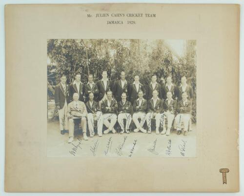 ‘Mr. Julien Cahn’s Cricket Team Jamaica 1929’. Official sepia photograph of the touring party, seated and standing in rows in cricket attire and tour blazers. Nicely signed in black ink to the photograph by sixteen members of the party. Signatures include