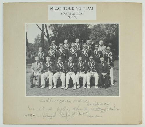 M.C.C. tour to South Africa 1948/49. Original mono photograph of the M.C.C. touring party, seated and standing in rows in cricket attire and tour blazers. The photograph laid down to mount with printed title to top border and signed in ink to the lower bo