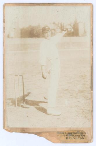 Wilfred Rhodes. Yorkshire, Europeans, Patiala & England 1899-1930. Sepia cabinet card photograph of Rhodes depicted full length in bowling pose wearing Yorkshire cap. Cabinet card by E. Hawkins & Co, Brighton. 4.25”x6.5”. Old adhesive marks to edges with 