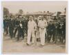 Holmes and Sutcliffe. 555 Record partnership 1932. Original sepia press photograph of Percy Holmes and Herbert Sutcliffe walking off the field surrounded by crowds following their historic record opening stand of 555 for Yorkshire against Essex at Leyton,