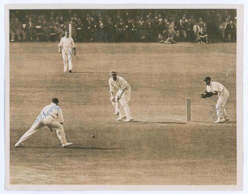 England v New Zealand 1931. Original sepia press photograph of England captain, Douglas Jardine, wearing his distinctive harlequin cap, in batting action in the first Test at Lord’s, 27th- 30th June 1931, with New Zealand players Tom Lowry, Curly Page and