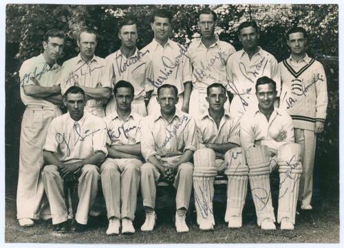 Middlesex C.C.C. 1947. Original mono press photograph of the 1947 Middlesex team seated and standing in rows wearing cricket attire. Signed in ink to the photograph by all twelve featured players. Signatures include Robins (Captain), Mann, Edrich, D. Comp