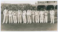 H.D.G. Leveson-Gower’s XI v M.C.C. Australian Touring Team 1936. Original mono photograph of the M.C.C. touring team to Australia lined up in one row at Scarborough, wearing cricket attire. Players’ names annotated in pencil to verso are Farnes, Holmes, W